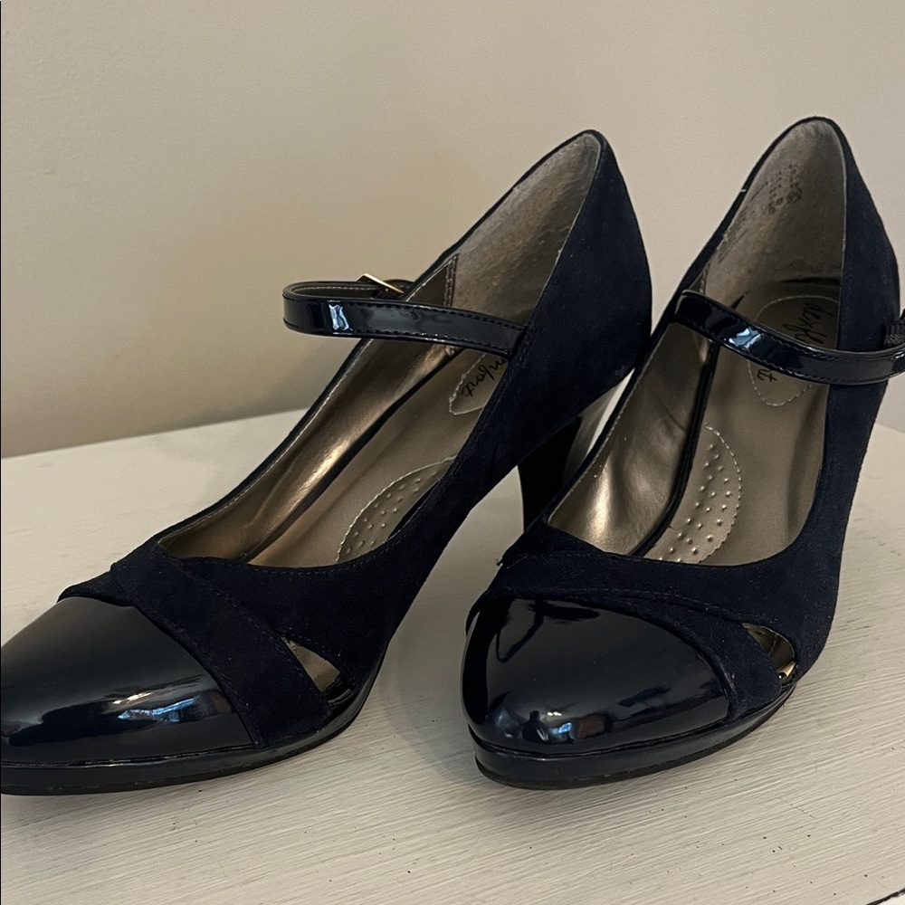 Navy blue pumps with ankle strap